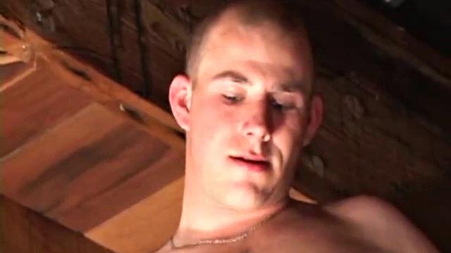 Perched in the rafters of an old garage, Cory Woodall begins stroking his dick. It doesn't take very long for a massive drop of cum t ohit the floor below.