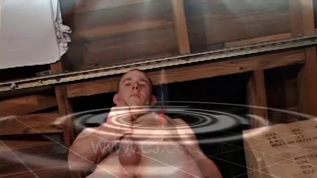 Perched in the rafters of an old garage, Cory Woodall begins stroking his dick. It doesn't take very long for a massive drop of cum t ohit the floor below.