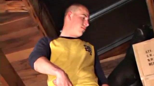Perched in the rafters of an old garage, Cory Woodall begins stroking his dick. It doesn't take very long for a massive drop of cum t ohit the floor below.