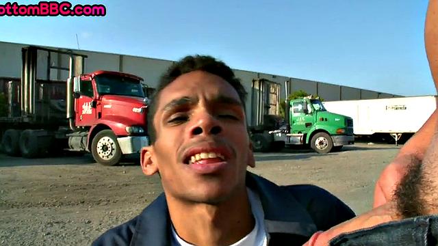 Real black worker picked up and nailed outdoors