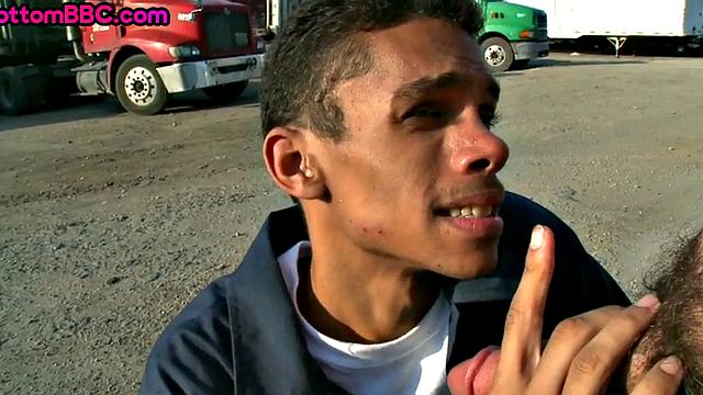 Real black worker picked up and nailed outdoors