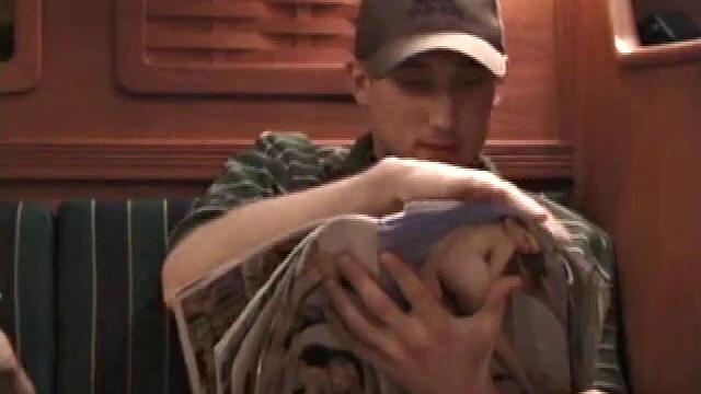 While these two are out on a friend's boat, Chad finds a stash of magazines, and they each start jacking off. It's not long before Nick has his cock in Chad's mouth.