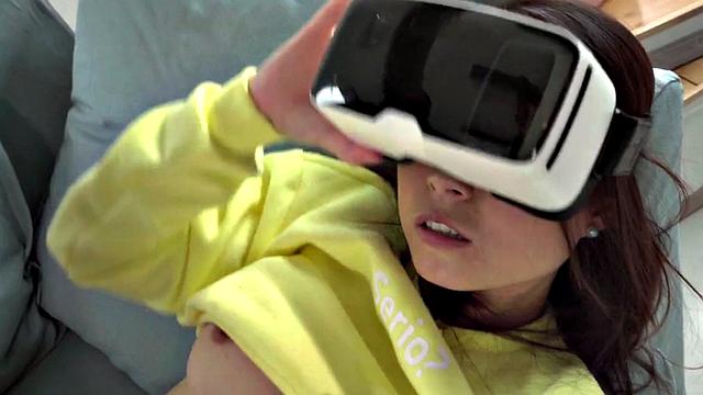 A petite Asian babe pleasure herself before taking on a black rod in VR