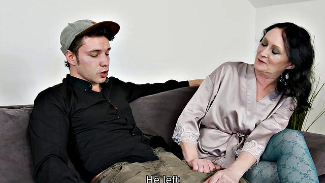 MATURE4K. Mature has sex with her stepson on the grey sofa