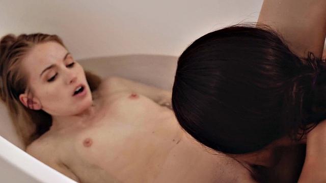 Bathing lesbians scissoring in bathtub after pussylicking