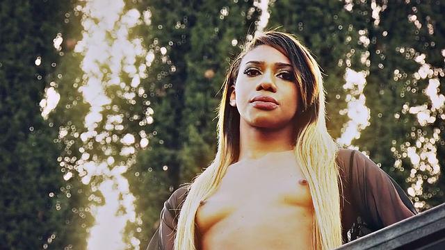 Roundbooty black trans jerks cock while assfucked