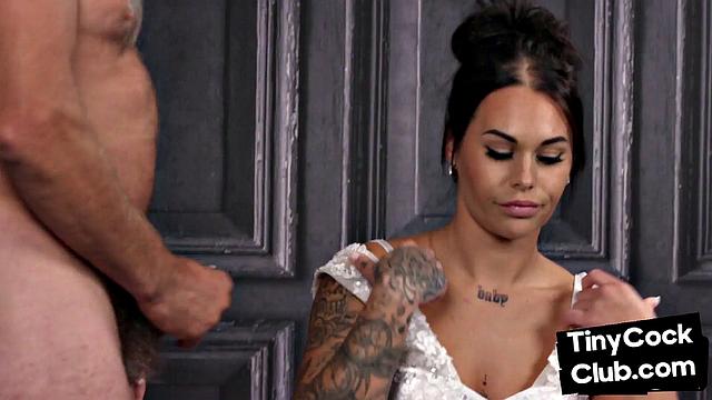 Busty amateur femdom bride jerking small cock of her husband