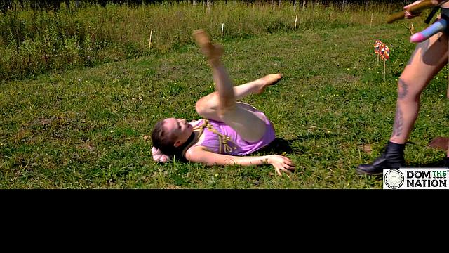 Piss drinking beauty flogged in sunny day domination ballet