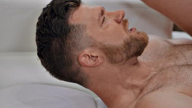 Athletic jock bareback fucks his bottom BF at home.