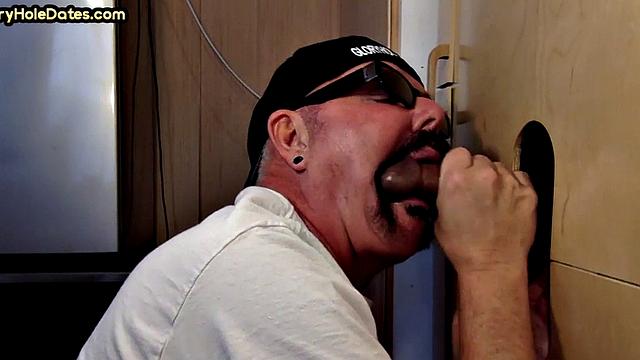 Gloryhole DILF wildly sucks Black meat in closeup