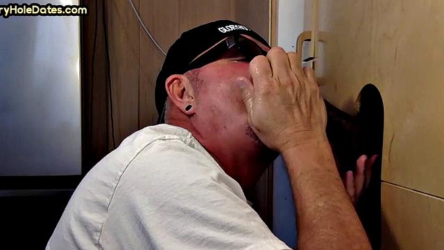 Gloryhole DILF wildly sucks Black meat in closeup