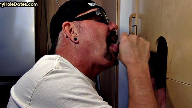 Gloryhole DILF wildly sucks Black meat in closeup
