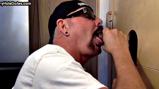 Gloryhole DILF wildly sucks Black meat in closeup