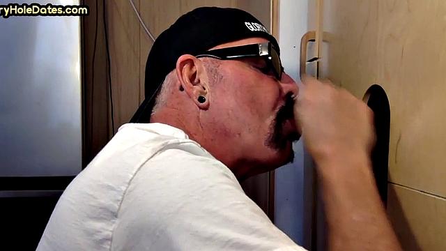 Gloryhole DILF wildly sucks Black meat in closeup