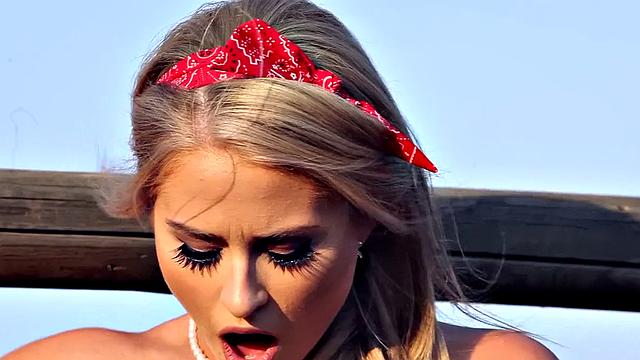 Blonde in lingerie & glasses masturbates in the garden while wearing thongs