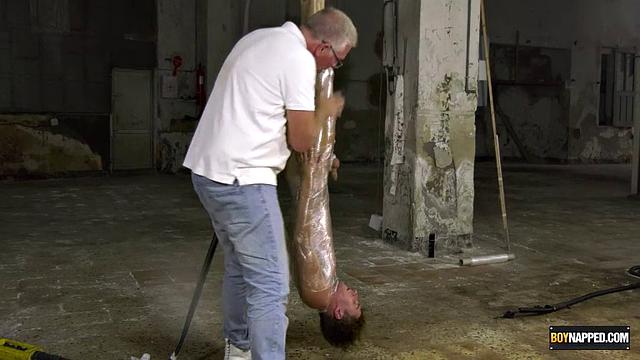 Ariel Black hangs bound and exposed while Sebastian Kane takes full control