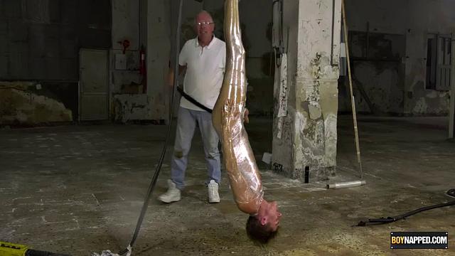 Ariel Black hangs bound and exposed while Sebastian Kane takes full control