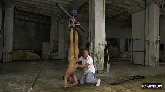 Ariel Black hangs bound and exposed while Sebastian Kane takes full control