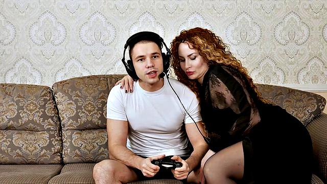 Tanya Foxxx gets her big tits fucked while gaming and getting a facial