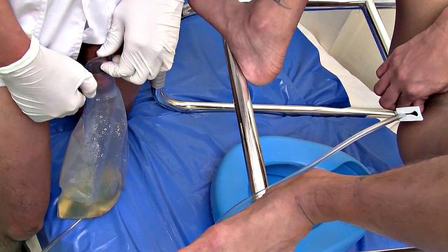 Asian twink pisses and gets fucked in medical fetish