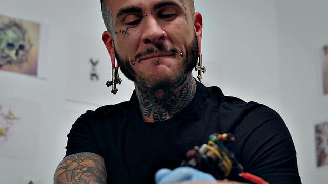 Bottom stud drilled by tattoo and piercing artist