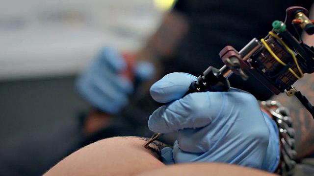 Bottom stud drilled by tattoo and piercing artist