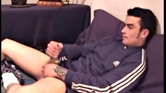 Even when he's fully dressed you can tell that Nicoya is heavily tattooed. Nicoya works up a pretty good bulge inside his boxers. By the time he takes off and really grabs his dick, he's already leaking.