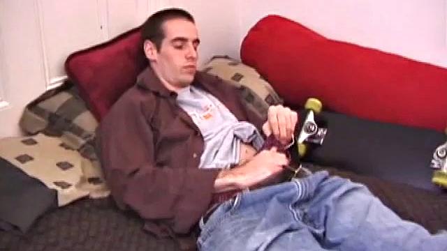 There's some good porn on the TV, so James Shafer decides to beat off. He pulls out his pierced cock and strokes it with determination, until he blows his load all over his chest.