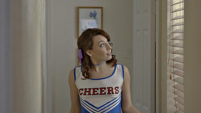 A Petite With Pom-Poms