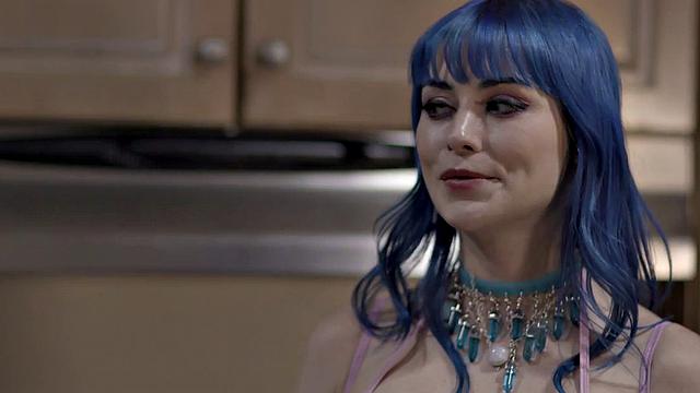 Masked blonde in sensual cosplay