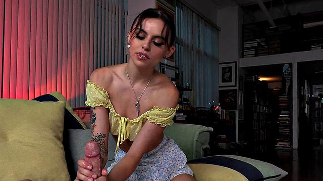 Oiled amateur with small boobs gives POV handjob