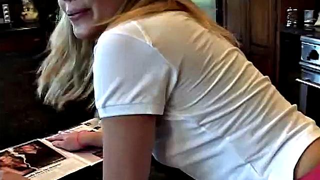 Little Summer stripping in her kitchen