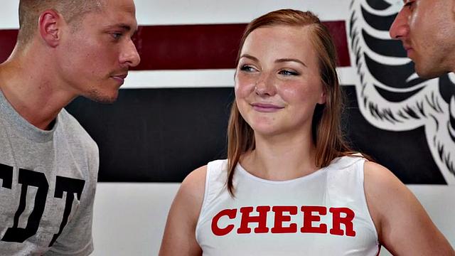 Redhead bisex cheerleader sucks and gets 3way banged