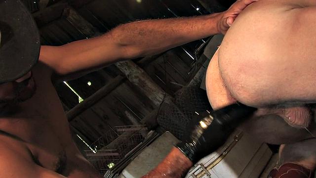 Big cock cowboy with hat gives hard fisting on hay in stable