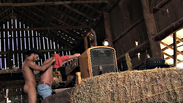 Big cock cowboy with hat gives hard fisting on hay in stable