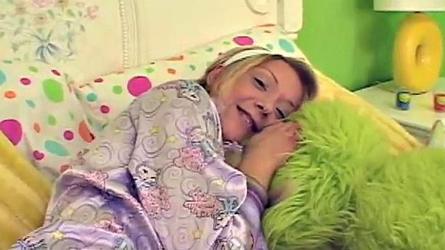 Little Lexy fingering her shaved pussy