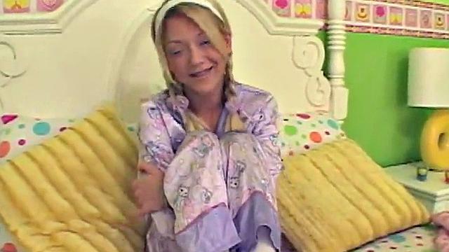 Little Lexy fingering her shaved pussy