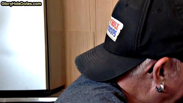 Moustache auntie sucking at gloryhole