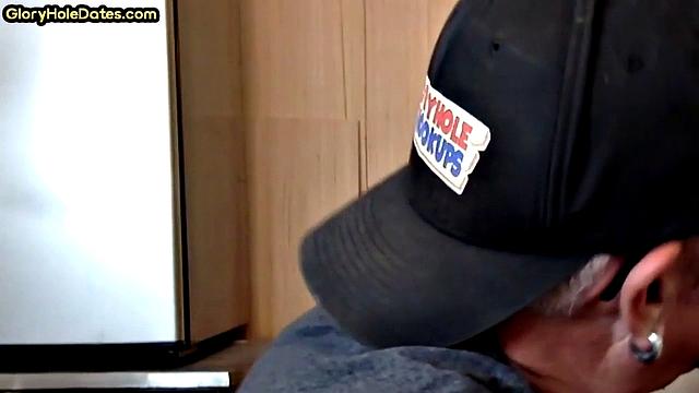 Moustache auntie sucking at gloryhole