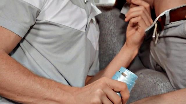 Gay stud deepthroats while toy his own cock with a pussytoy