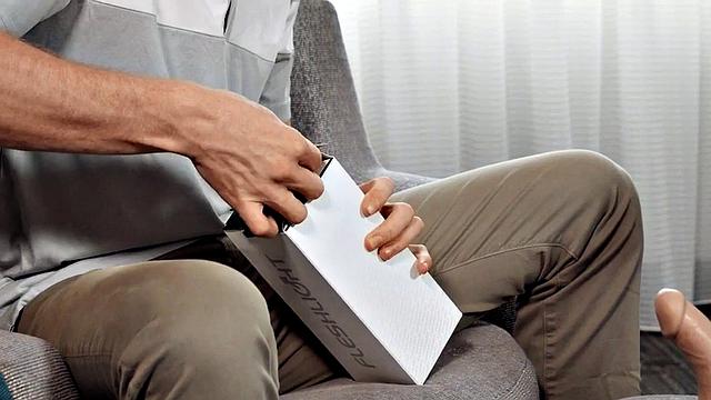 Gay stud deepthroats while toy his own cock with a pussytoy