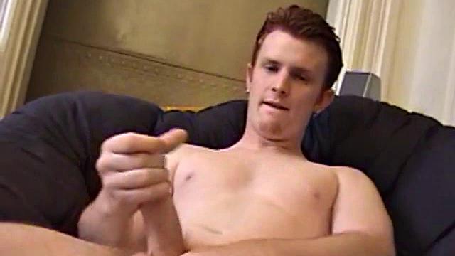 After stripping naked, Miles' uncut cock grows in his hands, as he plays with it. Stroking with determination and edging several times, he finally blows his load onto his tummy.