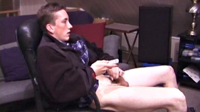 When Derek pulls down the pants his hard cock pops out and he begins stroking it. He obviously enjoys the porn video playing, because Derek soon pumps his warm cum onto his belly.