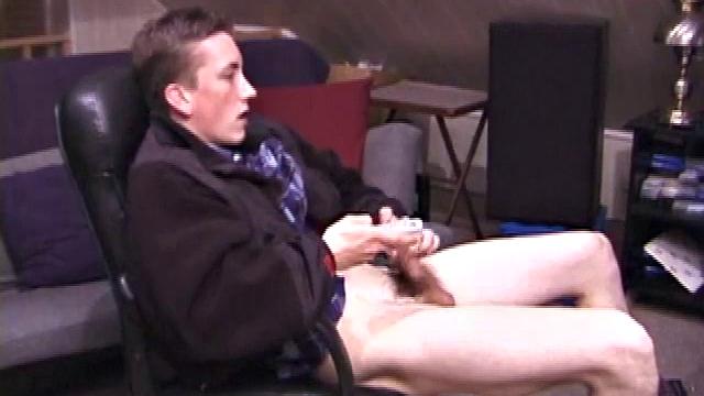 When Derek pulls down the pants his hard cock pops out and he begins stroking it. He obviously enjoys the porn video playing, because Derek soon pumps his warm cum onto his belly.