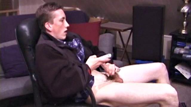 When Derek pulls down the pants his hard cock pops out and he begins stroking it. He obviously enjoys the porn video playing, because Derek soon pumps his warm cum onto his belly.