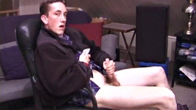 When Derek pulls down the pants his hard cock pops out and he begins stroking it. He obviously enjoys the porn video playing, because Derek soon pumps his warm cum onto his belly.