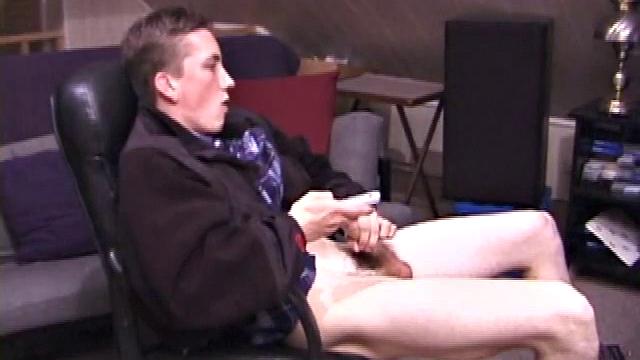 When Derek pulls down the pants his hard cock pops out and he begins stroking it. He obviously enjoys the porn video playing, because Derek soon pumps his warm cum onto his belly.