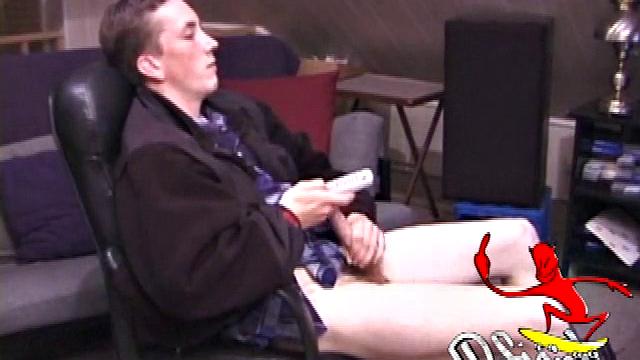 When Derek pulls down the pants his hard cock pops out and he begins stroking it. He obviously enjoys the porn video playing, because Derek soon pumps his warm cum onto his belly.