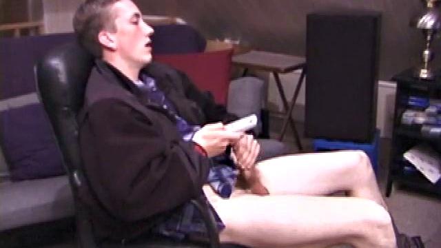 When Derek pulls down the pants his hard cock pops out and he begins stroking it. He obviously enjoys the porn video playing, because Derek soon pumps his warm cum onto his belly.