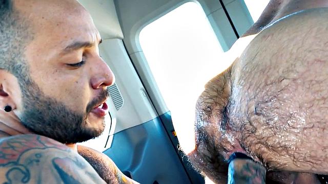 Rimmed gaydaddy with hairy inked body fisted in van